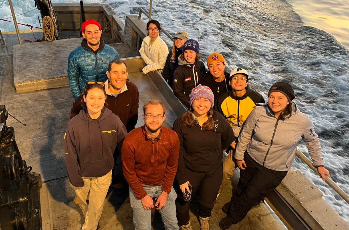 David Valentine with his students on deck of research vessel