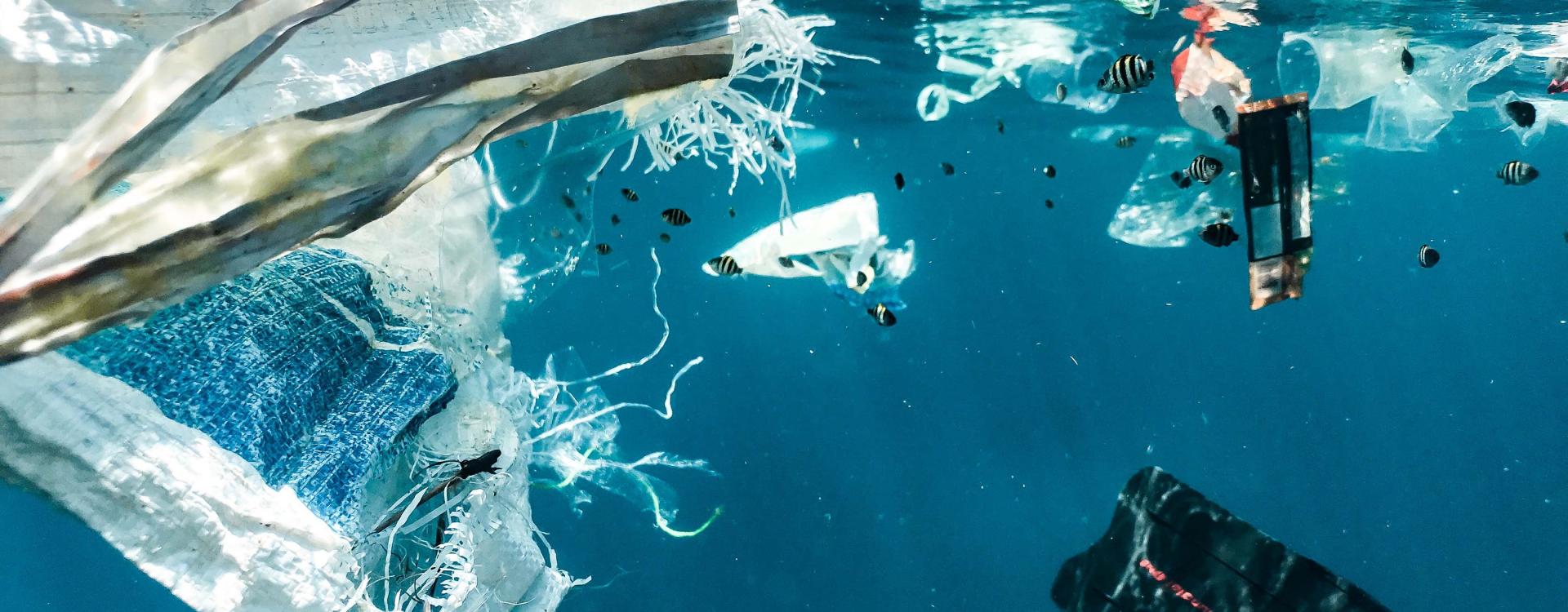 Plastic trash floating underwater