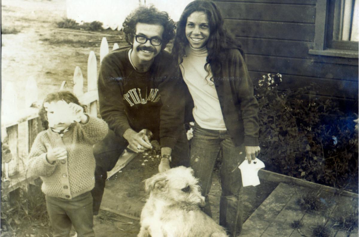 Armand Kuris with his wife, daughter, and dog