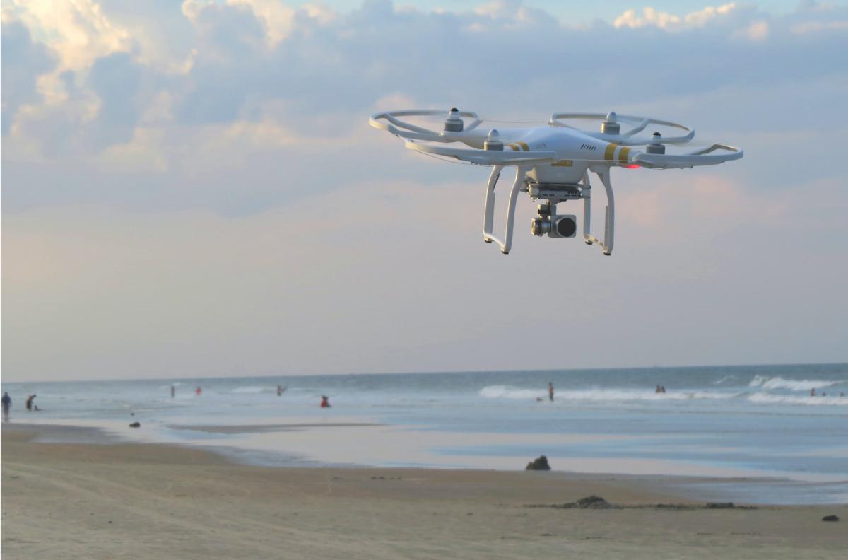 drone flying in the beach