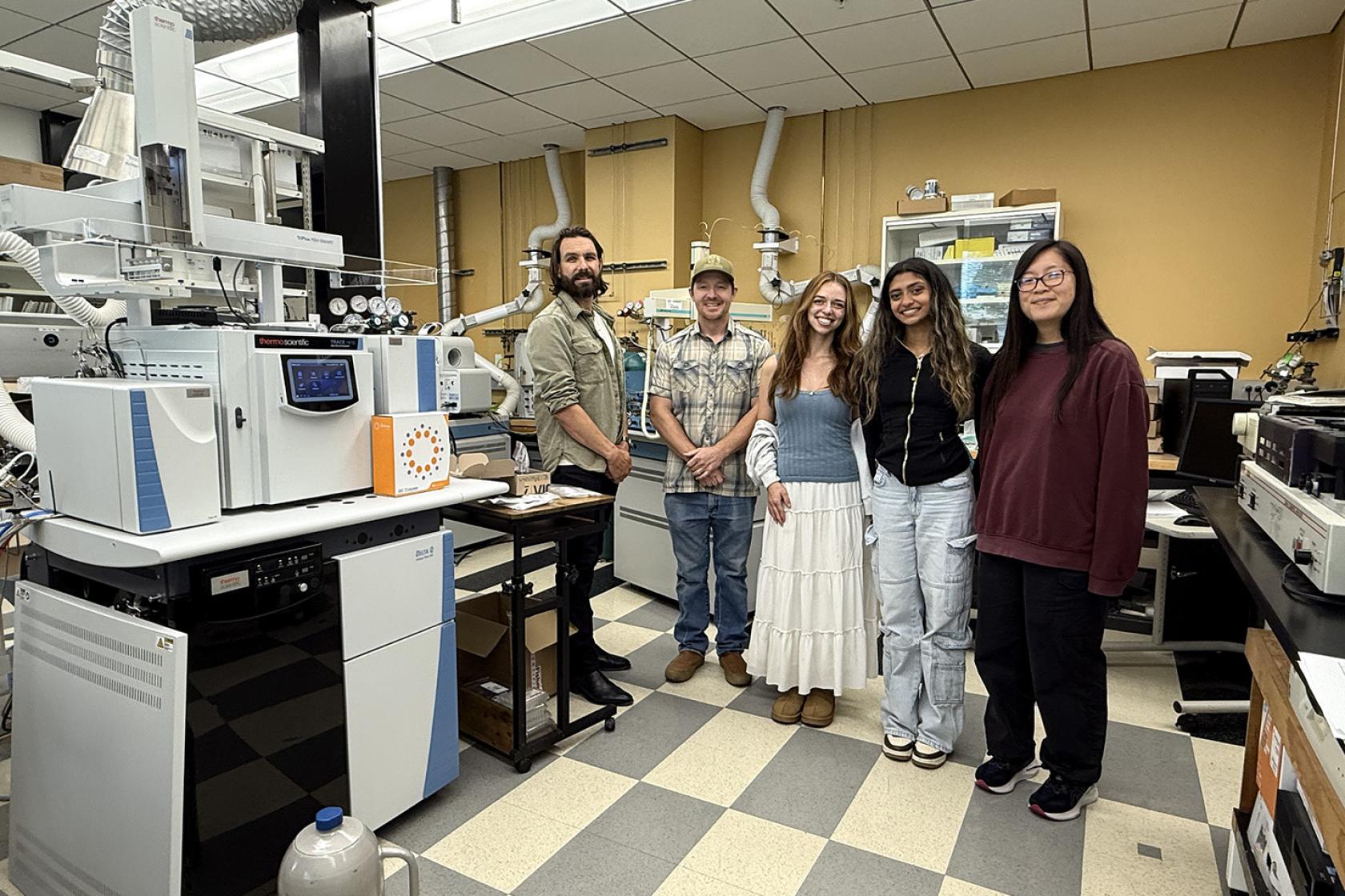 Analab crew posing for photo in the lab